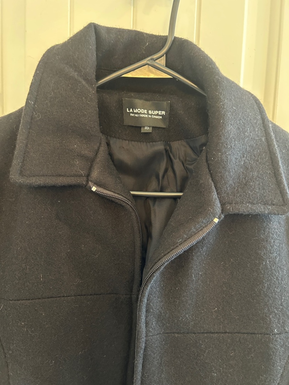 Women’s Black Wool Coat
75% Laine Wool
Lined wool coat jacket
Made in Canada - Picture 2 of 8